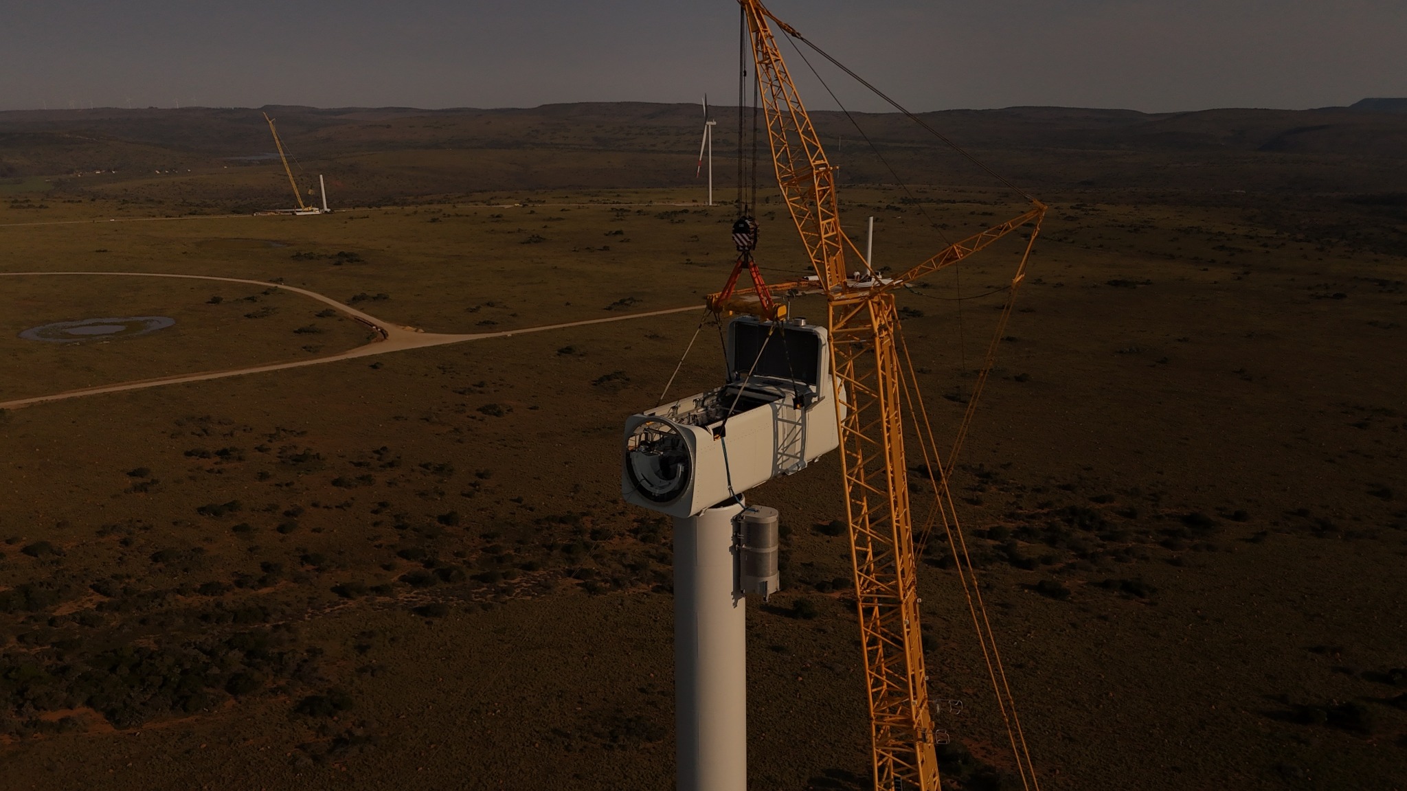 Wind turbine nacelle positioned during a construction milestone
